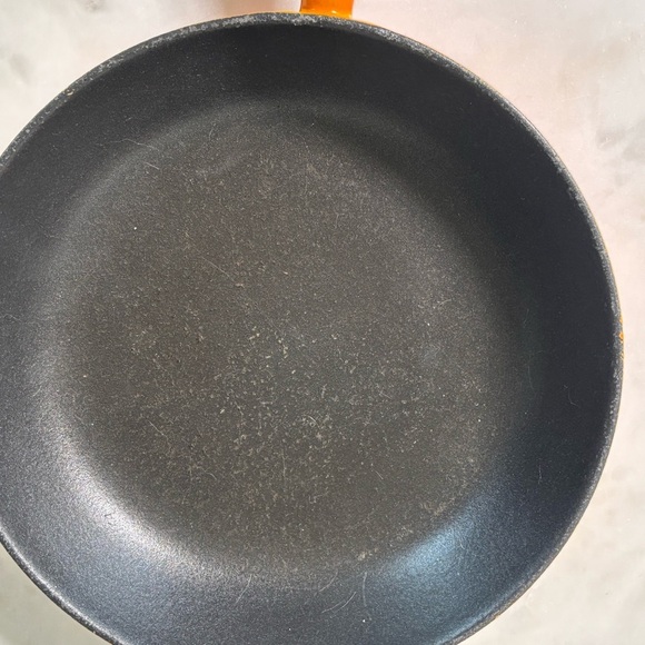 Le Creuset low heat enamelled cast iron skillet with nonstick coating in flame - Picture 4 of 5